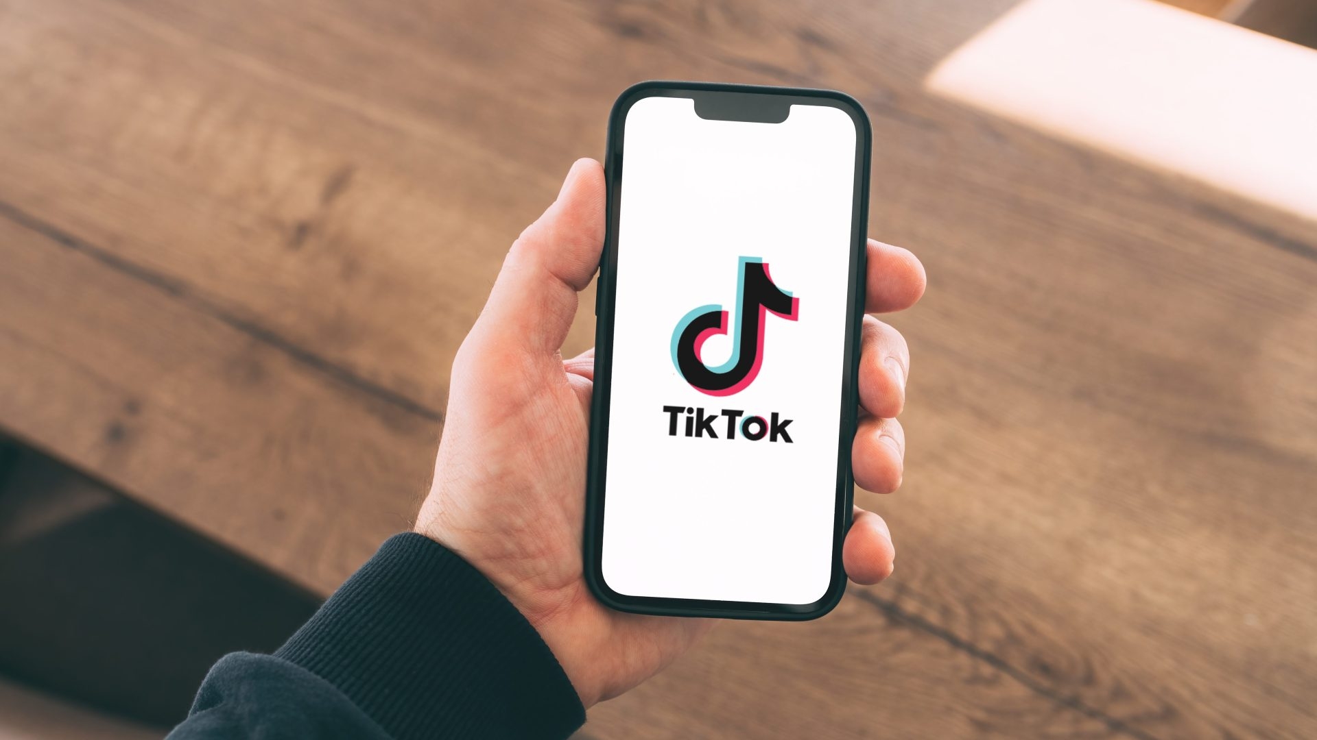 Tiktok mockup in hand